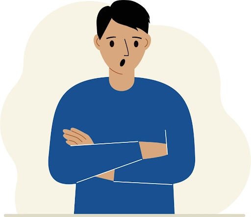 A man standing with arms crossed looking shocked or frozen