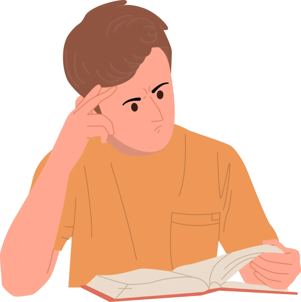 a man concentrating while reading a book