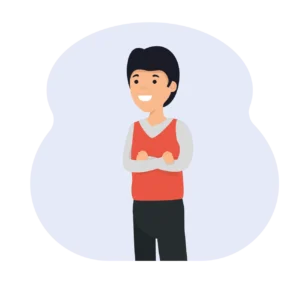 a smiling young boy standing with arms crossed looking happy